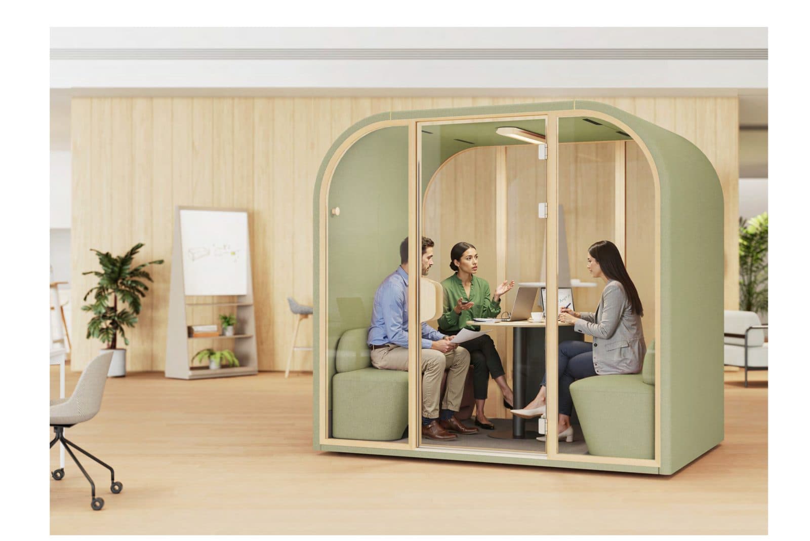 Team meeting inside an Alcove pod in an office